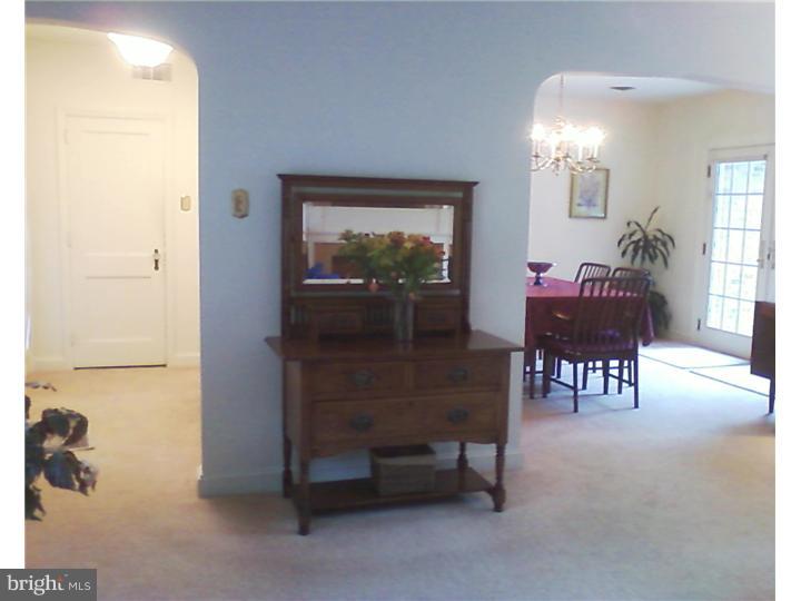 319 Southcroft Road Springfield, PA 19064 - Photo 4 of 24 a view of a dining room with furniture and chandelier