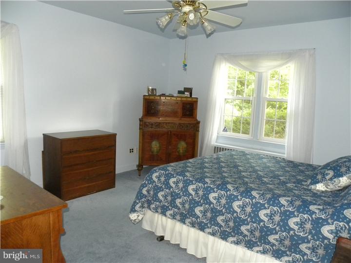 319 Southcroft Road Springfield, PA 19064 - Photo 9 of 24 a bedroom with a bed and a dresser