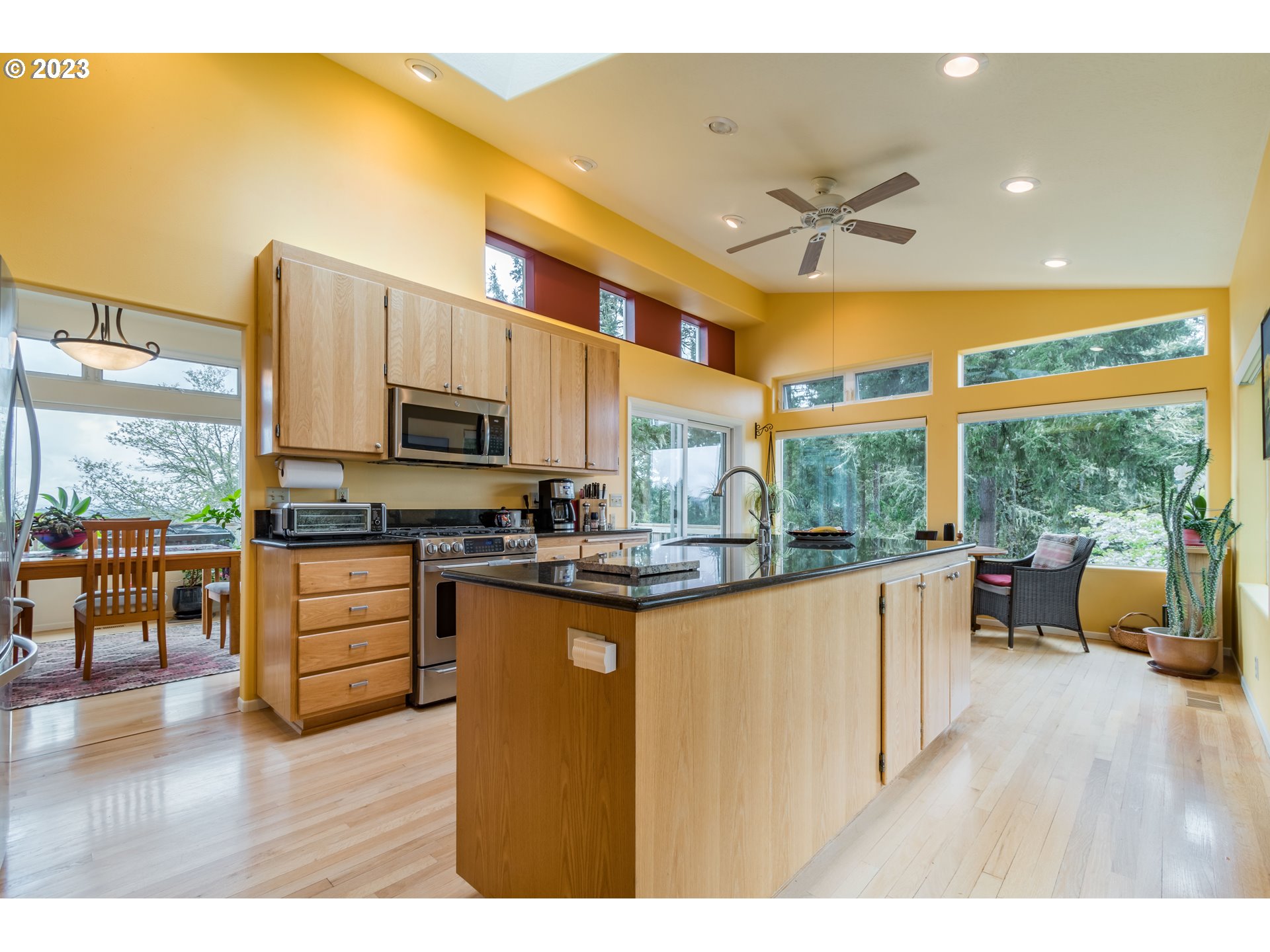 84984 Appletree Drive Eugene, OR 97405 - Photo 16 of 48 a kitchen with stainless steel appliances granite countertop a stove a sink and a refrigerator