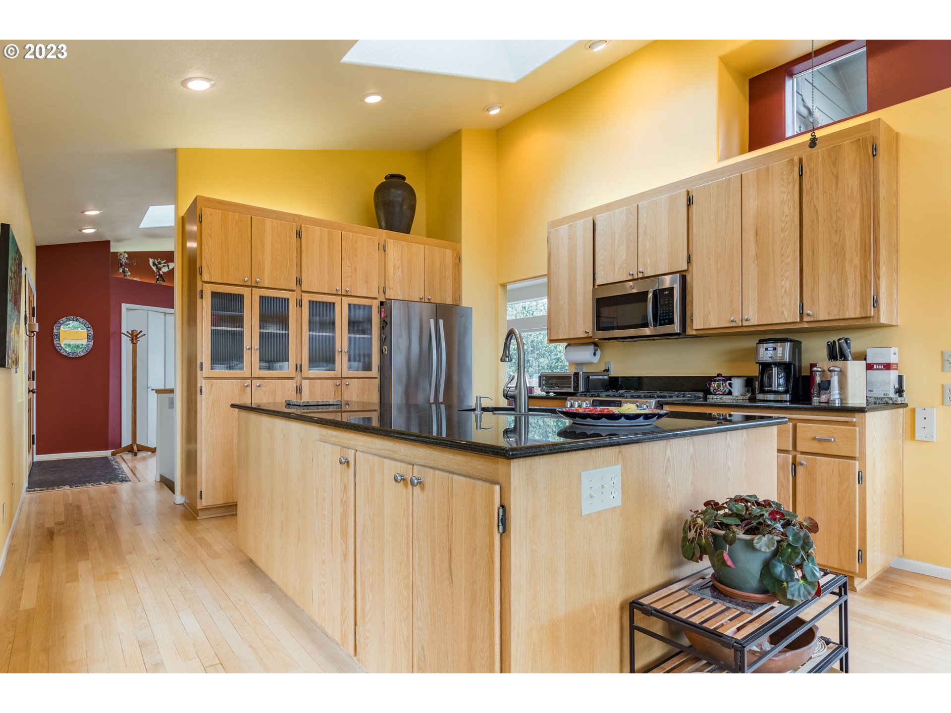 84984 Appletree Drive Eugene, OR 97405 - Photo 17 of 48 a kitchen with stainless steel appliances a sink a counter top space cabinets and a window