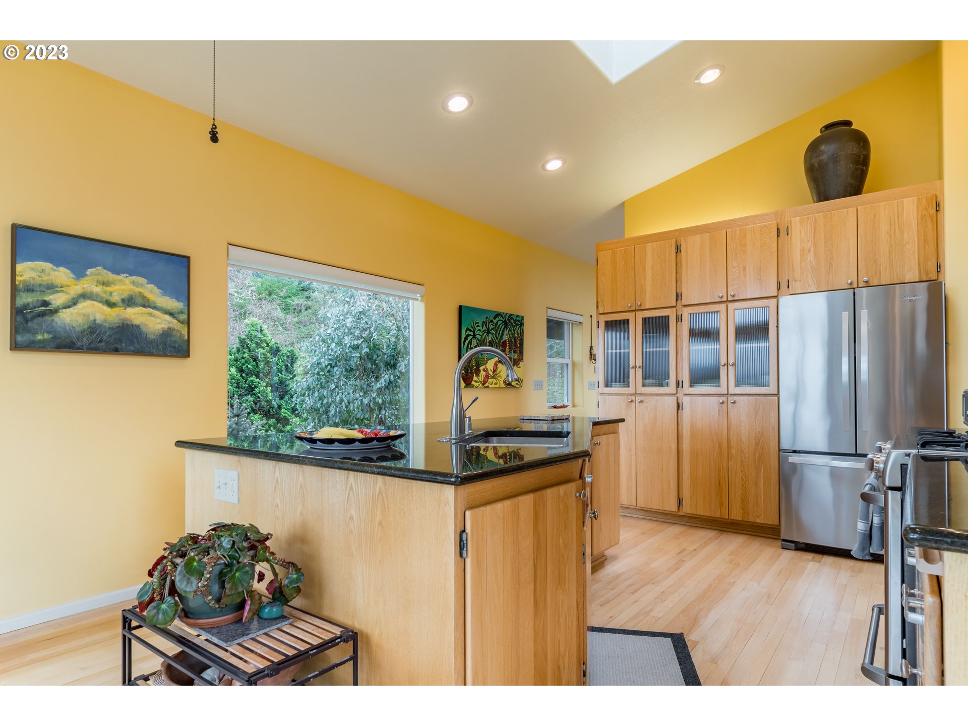 84984 Appletree Drive Eugene, OR 97405 - Photo 18 of 48 a kitchen that has a sink and a stove top oven