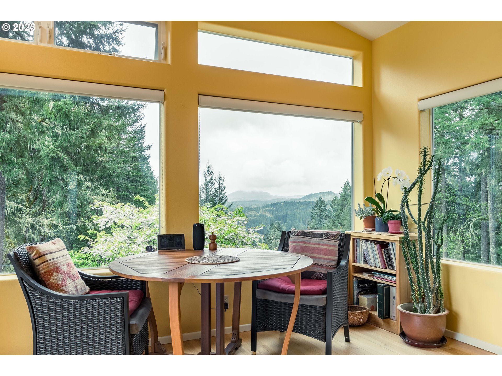 84984 Appletree Drive Eugene, OR 97405 - Photo 19 of 48 a balcony view with a large window and sitting space