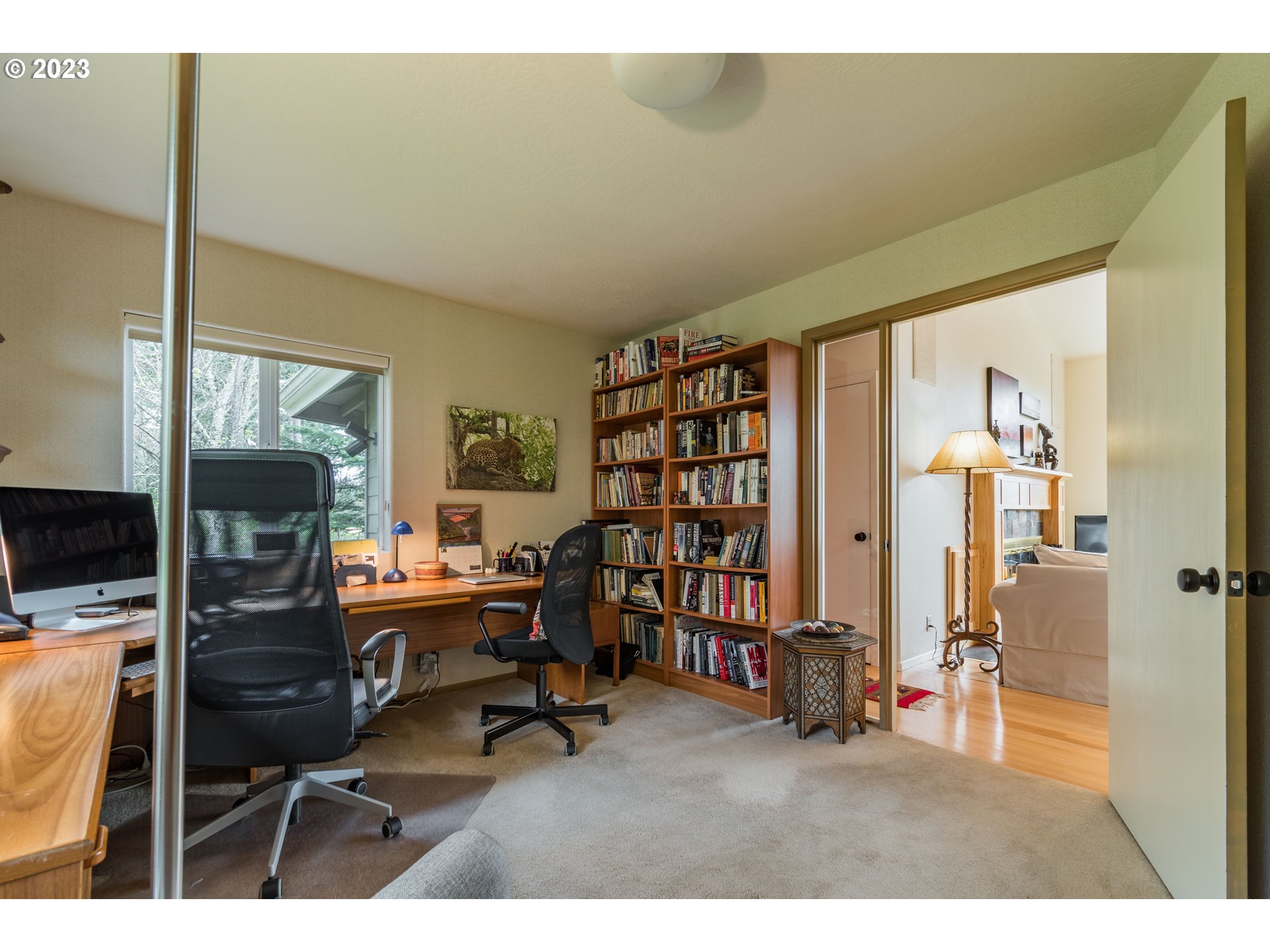 84984 Appletree Drive Eugene, OR 97405 - Photo 26 of 48 a view of a workspace with furniture and a window