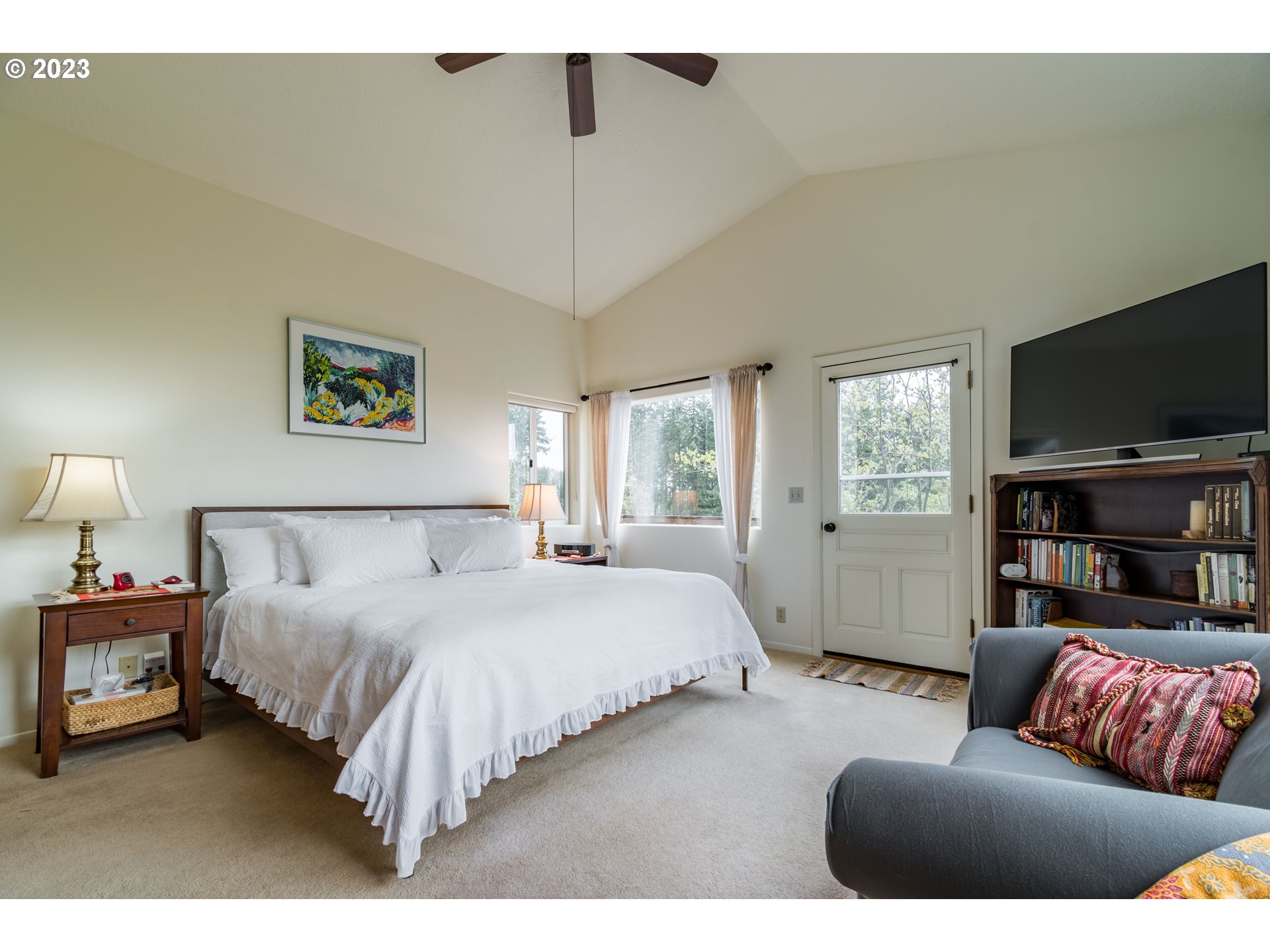 84984 Appletree Drive Eugene, OR 97405 - Photo 30 of 48 a bedroom with a bed couch and window