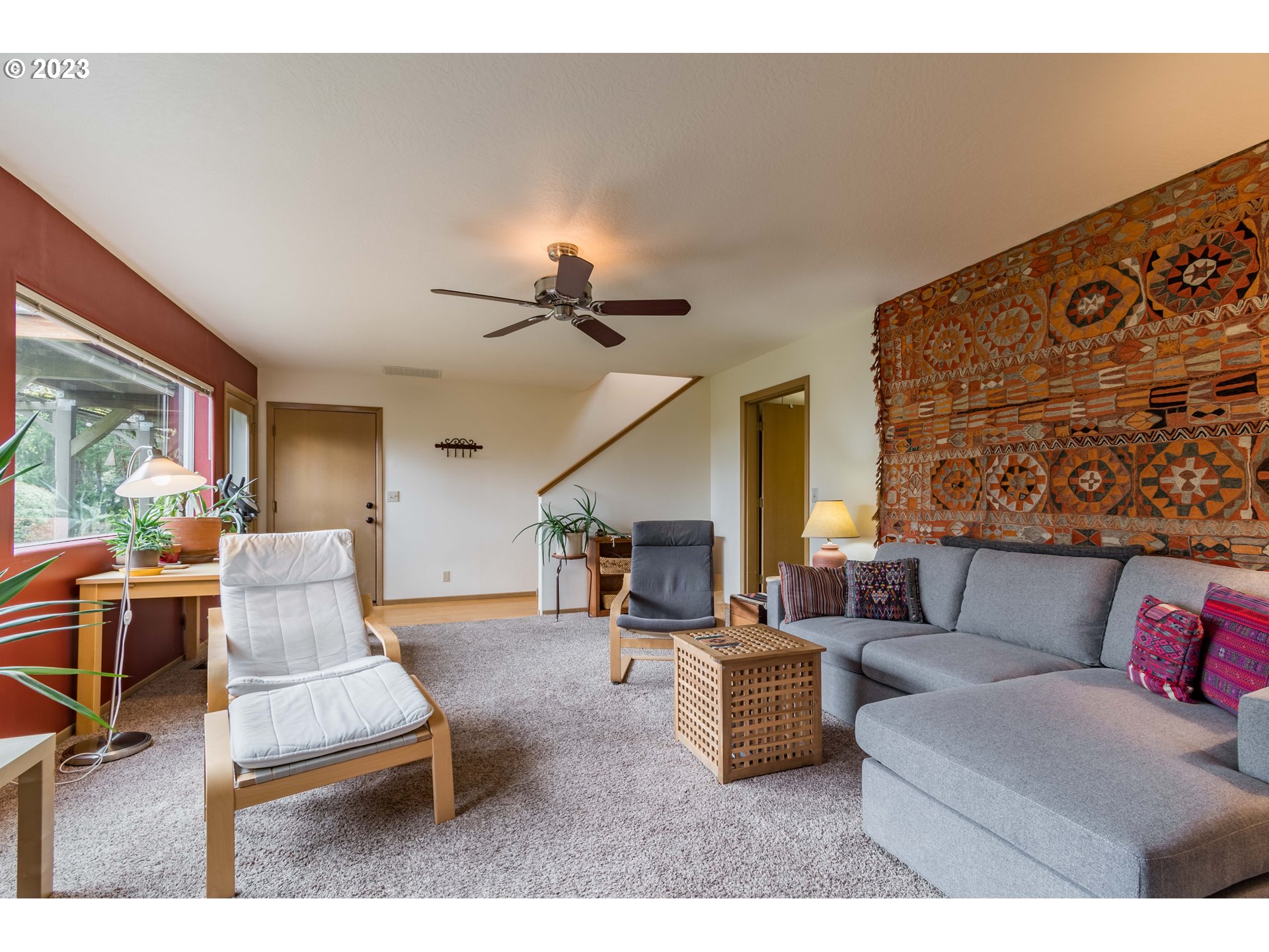 84984 Appletree Drive Eugene, OR 97405 - Photo 40 of 48 a living room with furniture and wooden floor