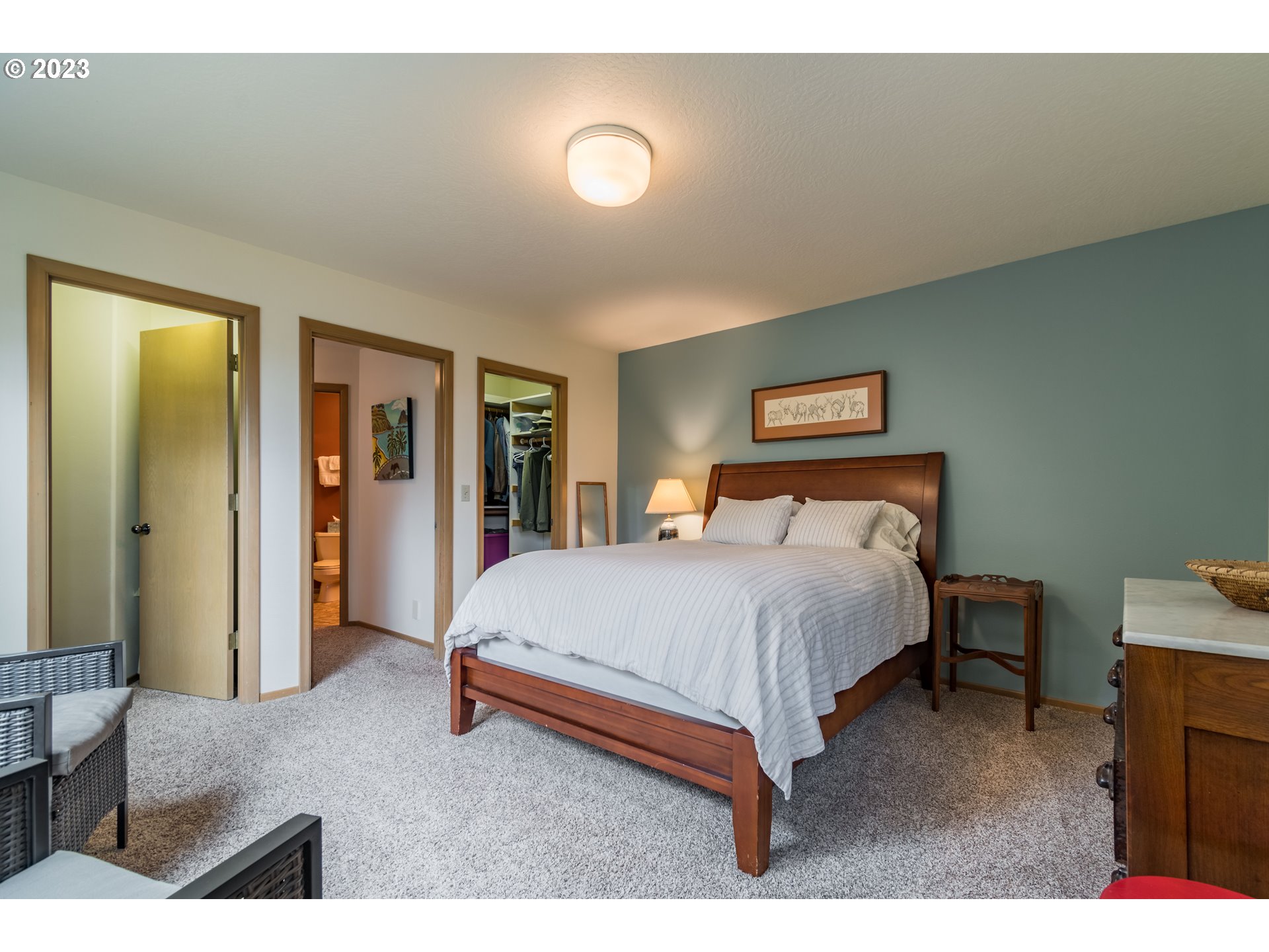 84984 Appletree Drive Eugene, OR 97405 - Photo 42 of 48 a bed room with a bed and a lamp