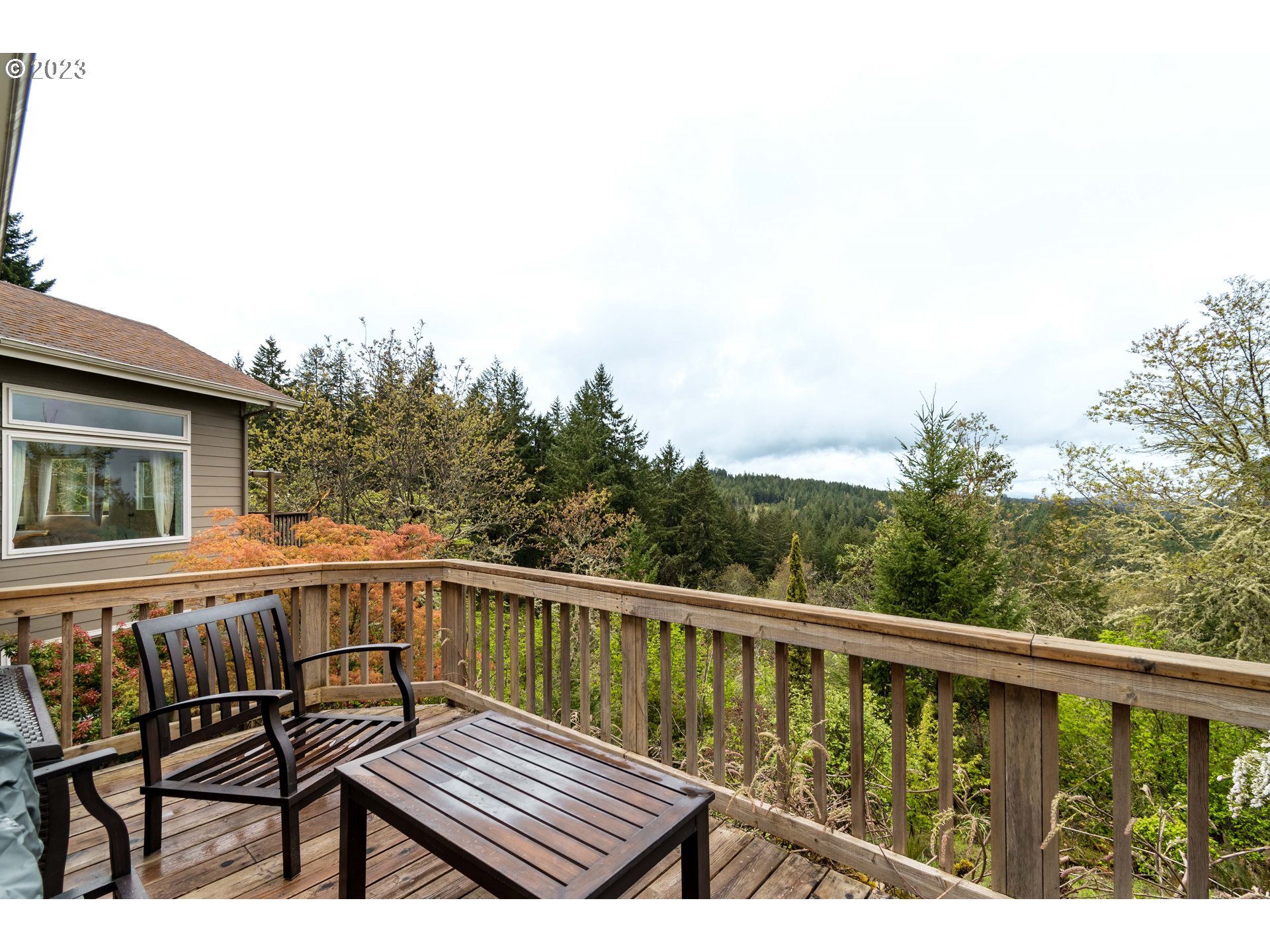 84984 Appletree Drive Eugene, OR 97405 - Photo 48 of 48 a view of a wooden deck with furniture