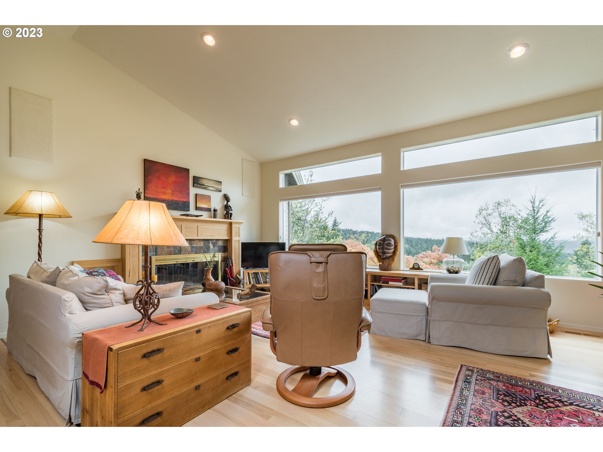 84984 Appletree Drive Eugene, OR 97405 - Photo 5 of 48 a living room with furniture and a large window