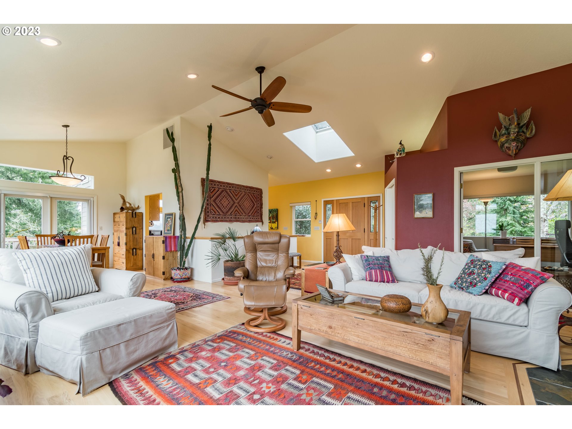 84984 Appletree Drive Eugene, OR 97405 - Photo 8 of 48 a living room with furniture and a large window