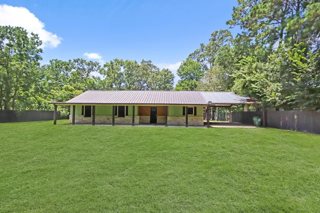 a view of a big yard next to a yard