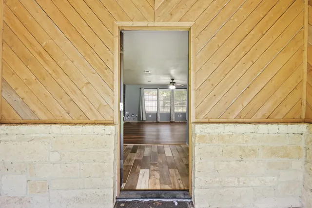 a view of empty room with windows