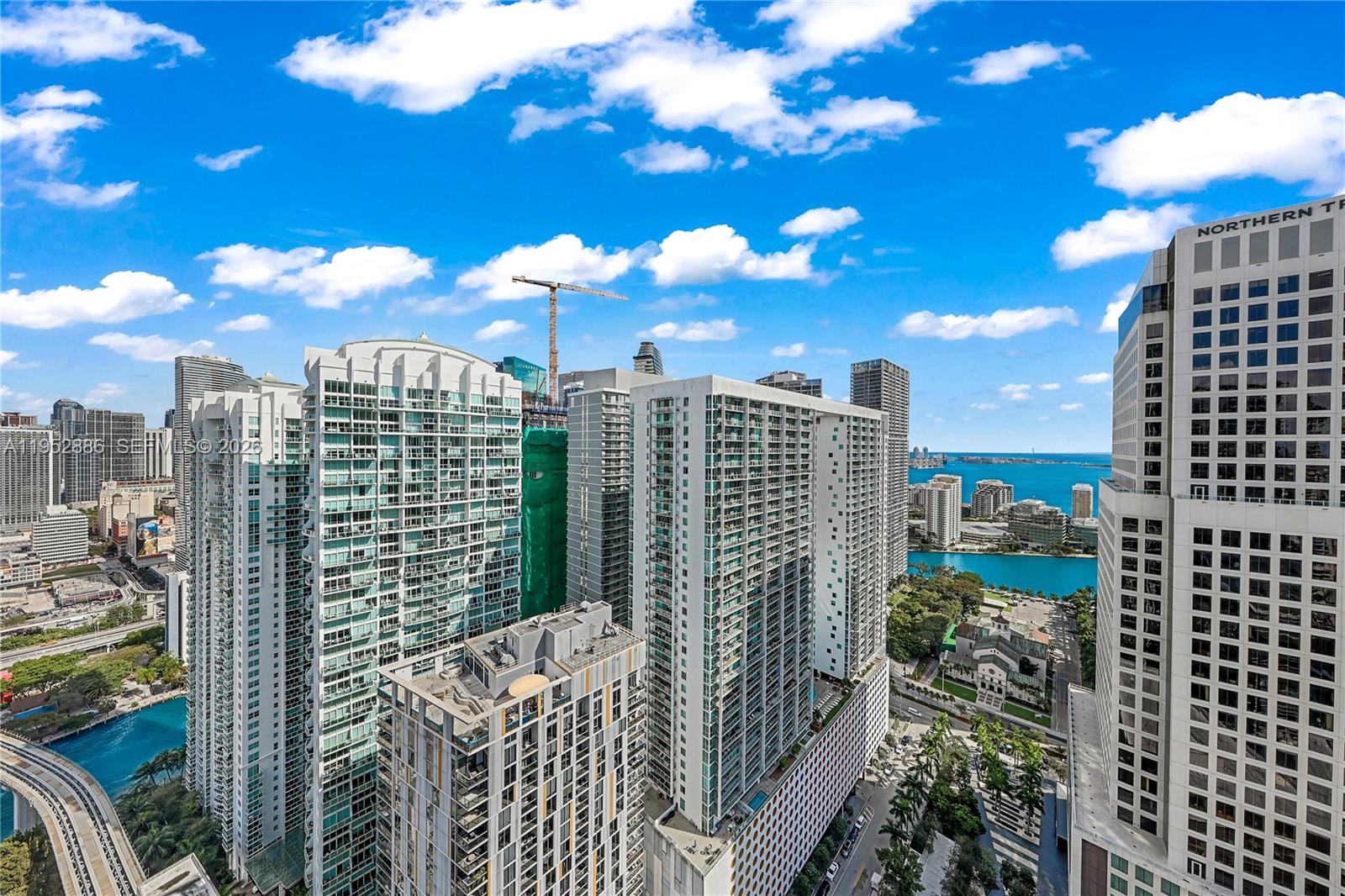 68 Southeast 6th Street, Unit 3309 Miami, FL 33131 - Photo 20 of 25 a view of a city with tall buildings