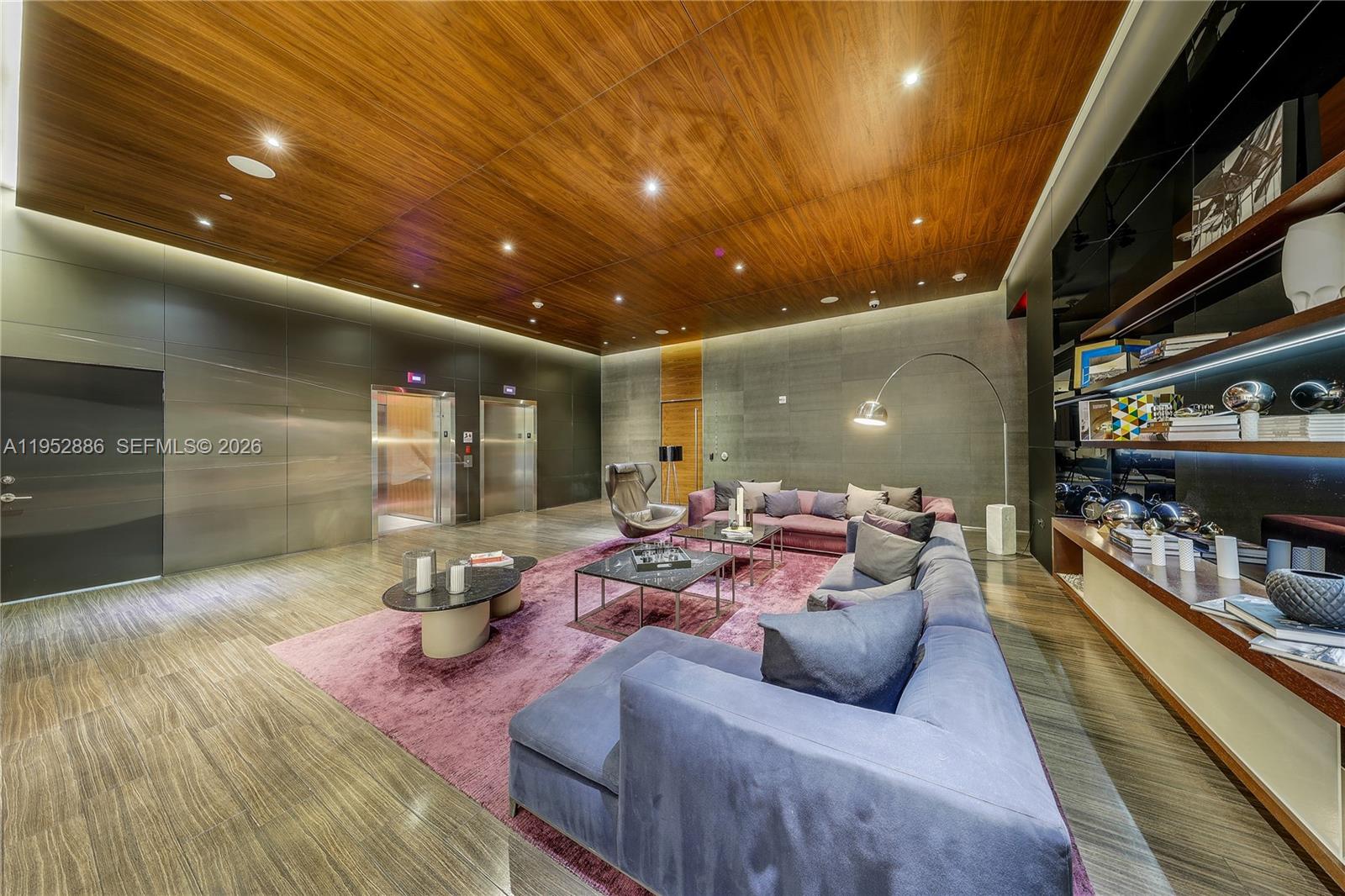 68 Southeast 6th Street, Unit 3309 Miami, FL 33131 - Photo 22 of 25 a living room with furniture