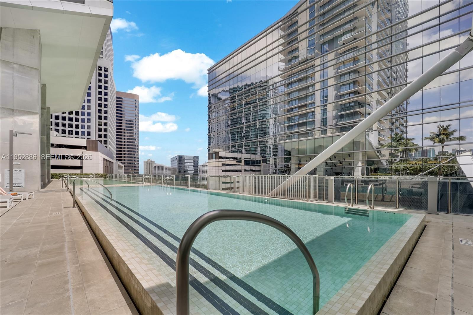 68 Southeast 6th Street, Unit 3309 Miami, FL 33131 - Photo 25 of 25 a view of swimming pool from a balcony