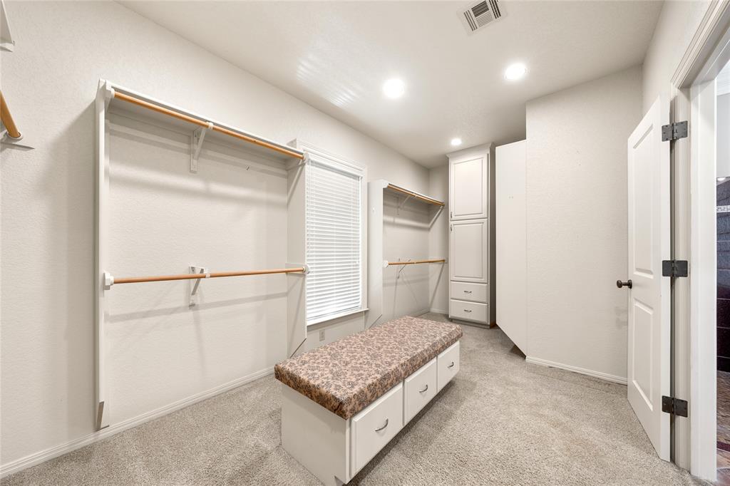 840 Winding Trail Crawford, TX 76638 - Photo 23 of 40 a living room with a refrigerator and dryer