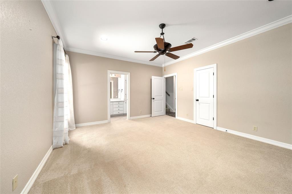 840 Winding Trail Crawford, TX 76638 - Photo 27 of 40 a view of an empty room with a ceiling fan