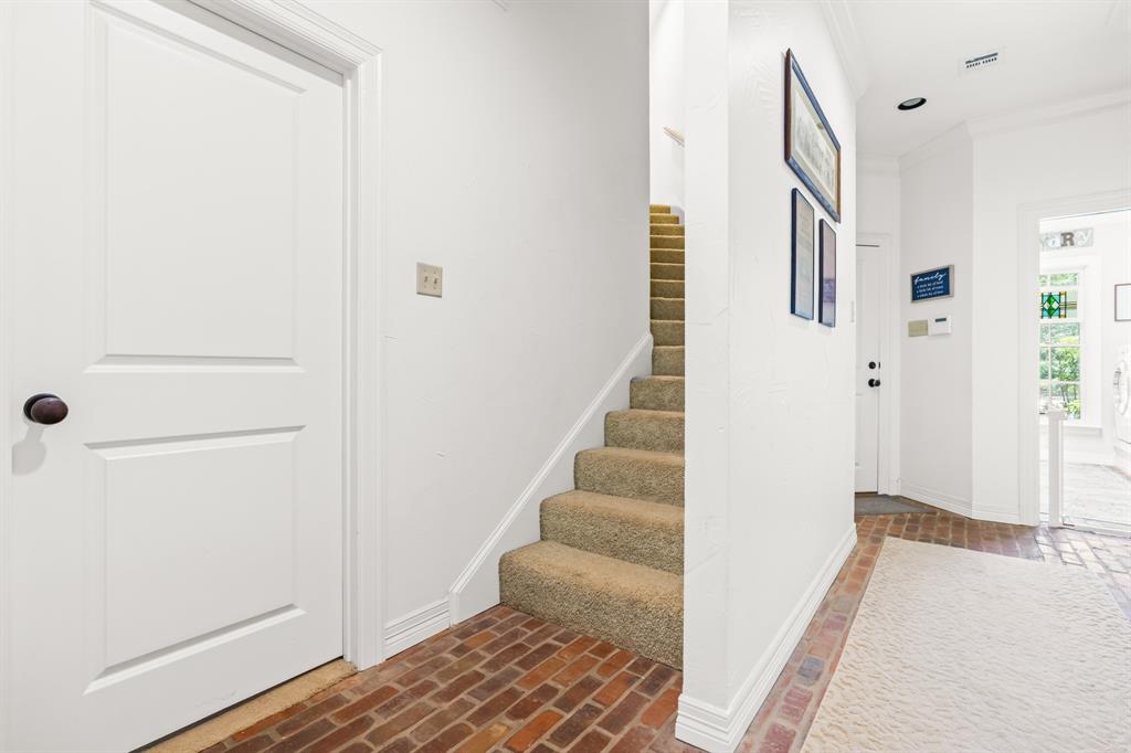 840 Winding Trail Crawford, TX 76638 - Photo 32 of 40 a view of a hallway with wooden floor and entryway
