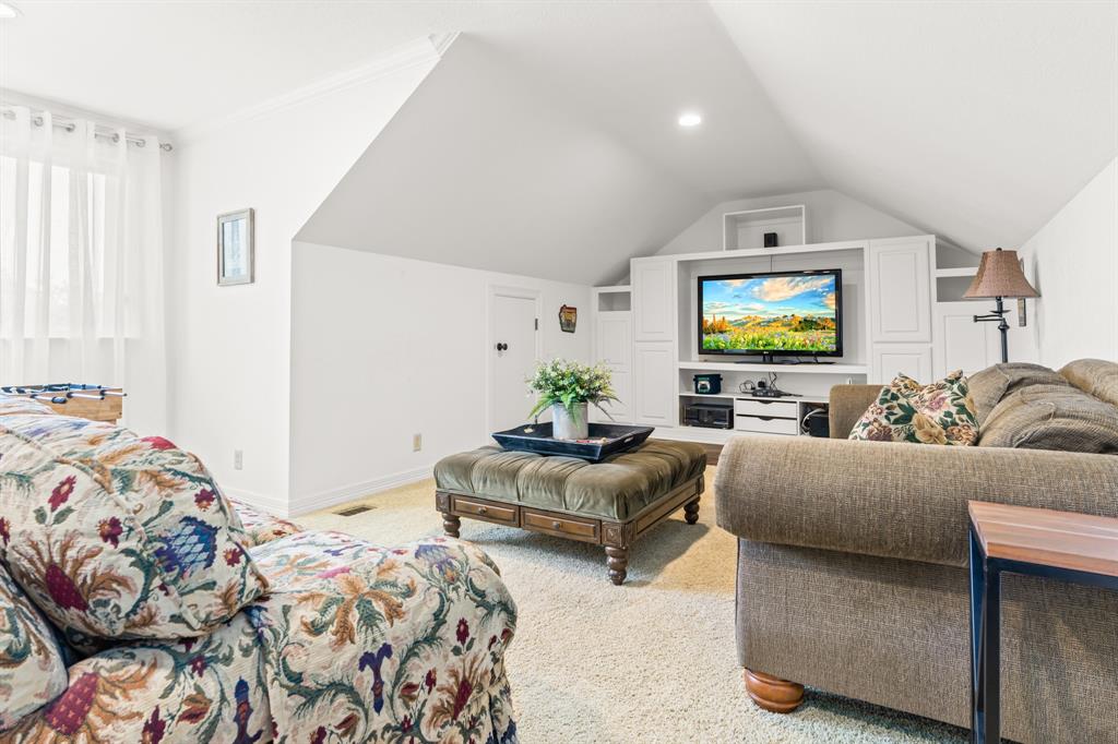 840 Winding Trail Crawford, TX 76638 - Photo 33 of 40 a living room with furniture and a flat screen tv