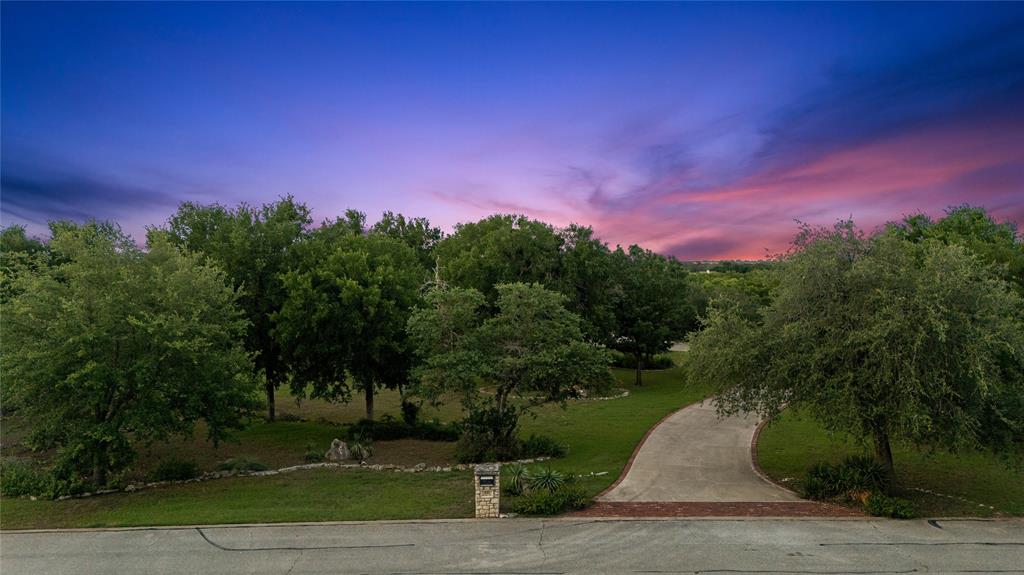 840 Winding Trail Crawford, TX 76638 - Photo 5 of 40 a view of a yard