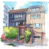 a front view of a building with garden