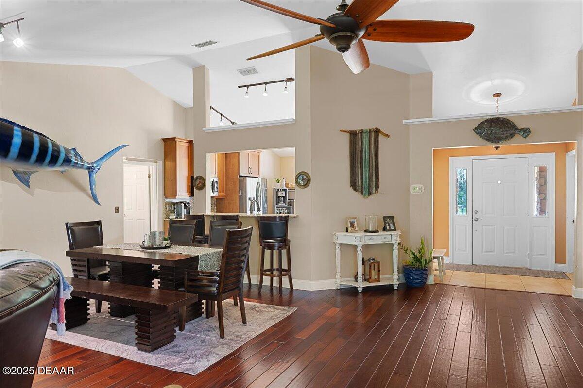 6225 Ranier Circle Port Orange, FL 32127 - Photo 11 of 50 a view of a dining room with furniture window and wooden floor