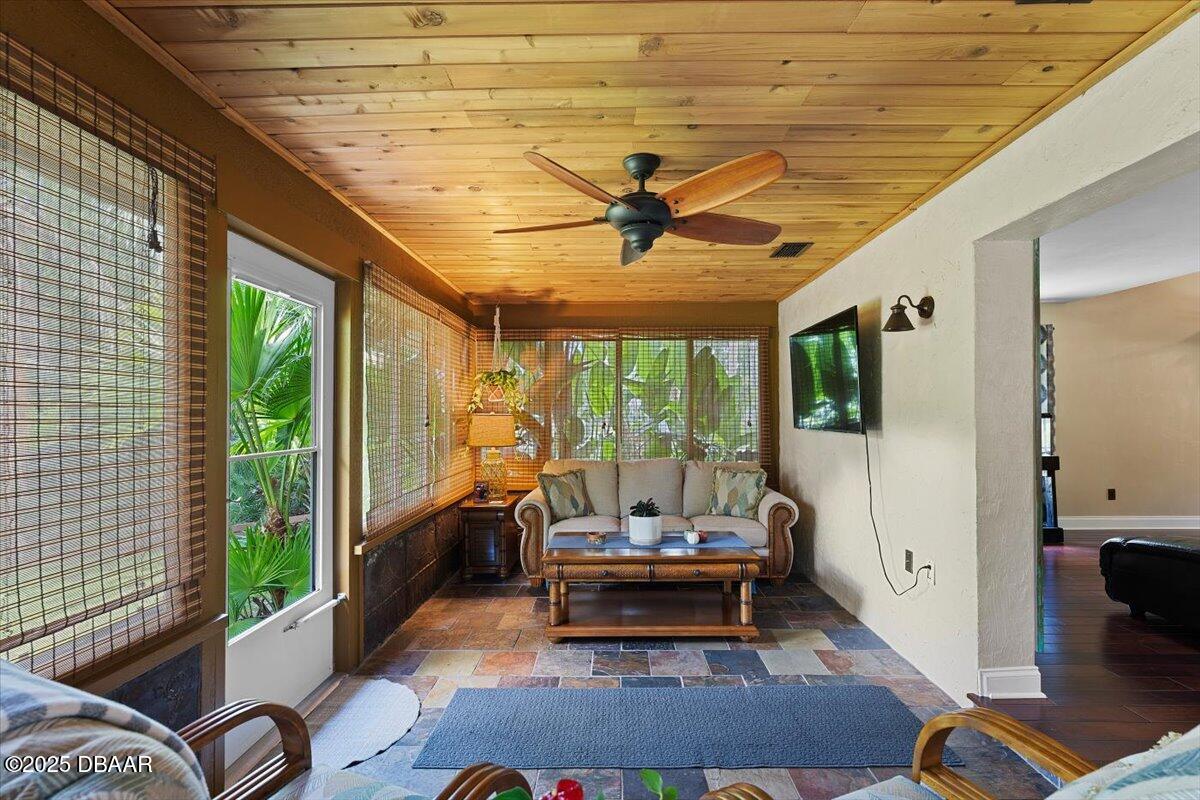 6225 Ranier Circle Port Orange, FL 32127 - Photo 15 of 50 a living room with furniture and a large window