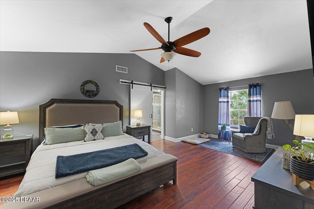 6225 Ranier Circle Port Orange, FL 32127 - Photo 17 of 50 a bedroom with a bed couch and window