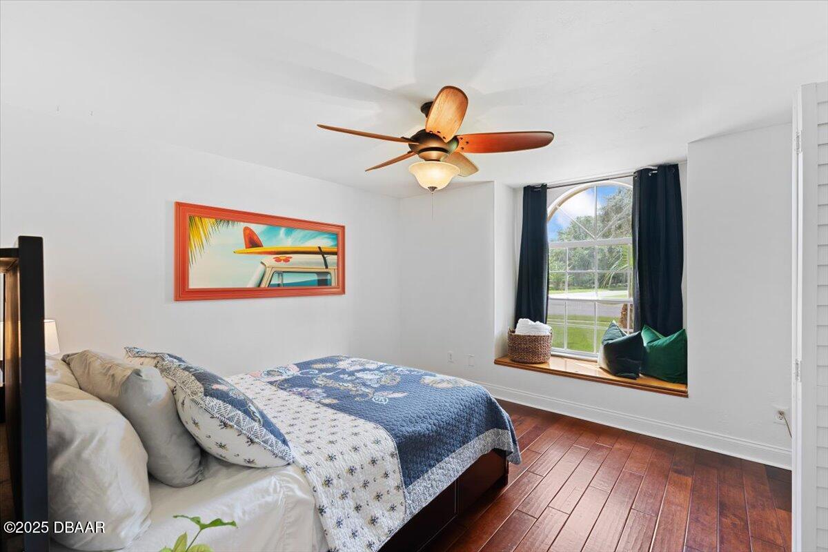 6225 Ranier Circle Port Orange, FL 32127 - Photo 25 of 50 a bedroom with a bed and a large window