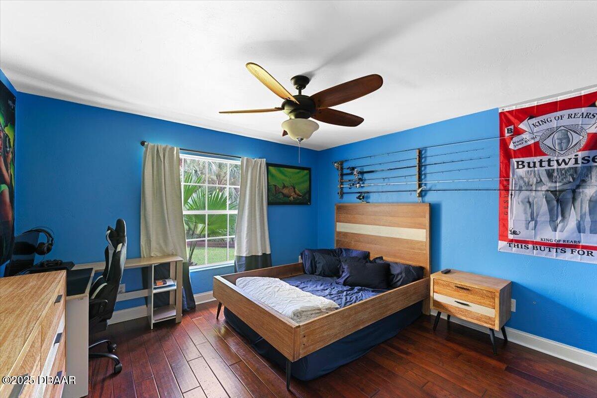 6225 Ranier Circle Port Orange, FL 32127 - Photo 29 of 50 a bedroom with furniture and wooden floor