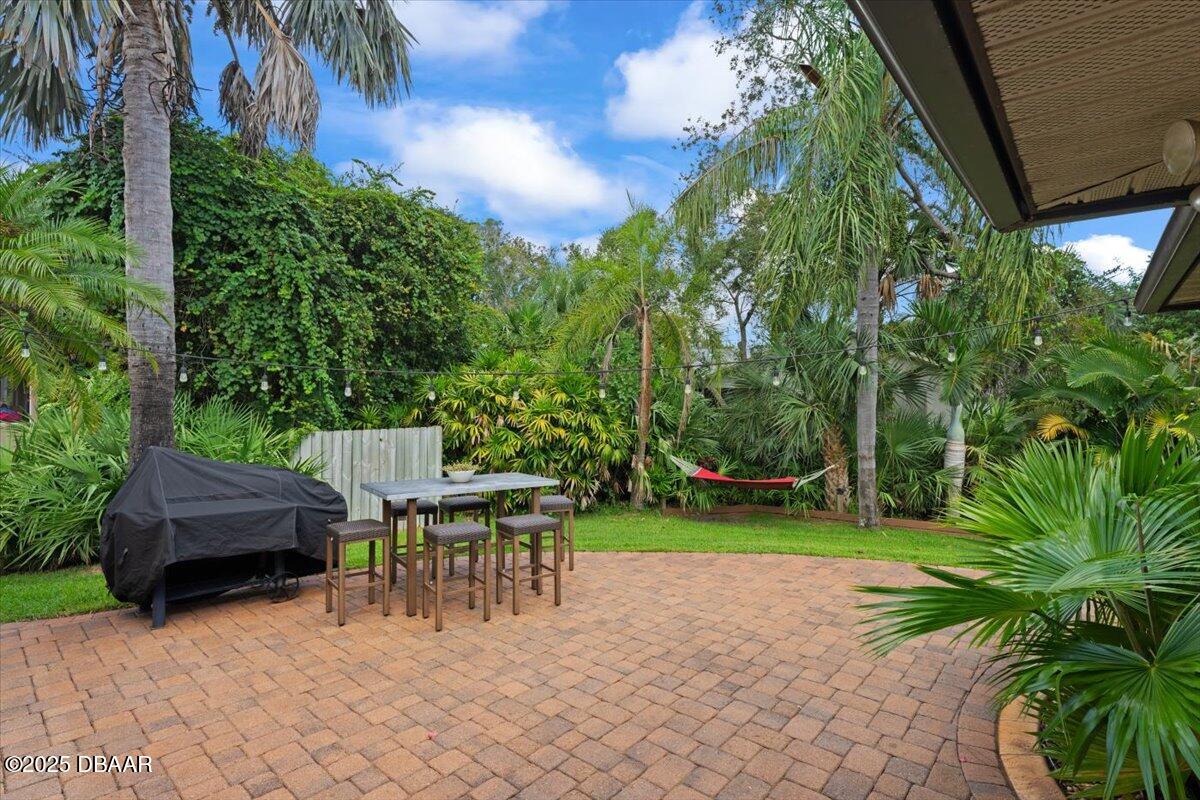6225 Ranier Circle Port Orange, FL 32127 - Photo 31 of 50 a view of backyard with seating area and green space