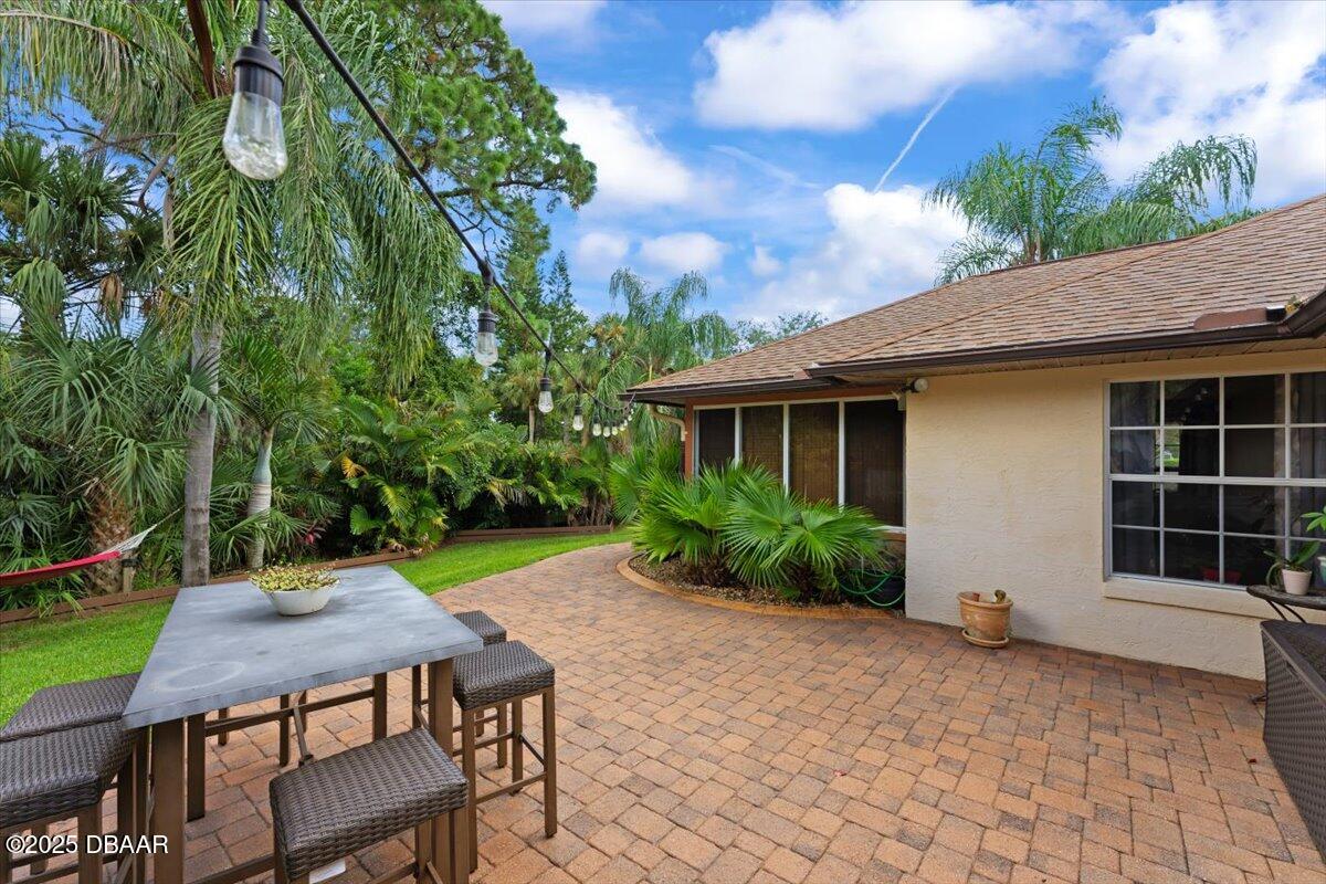 6225 Ranier Circle Port Orange, FL 32127 - Photo 32 of 50 a front view of a house with garden
