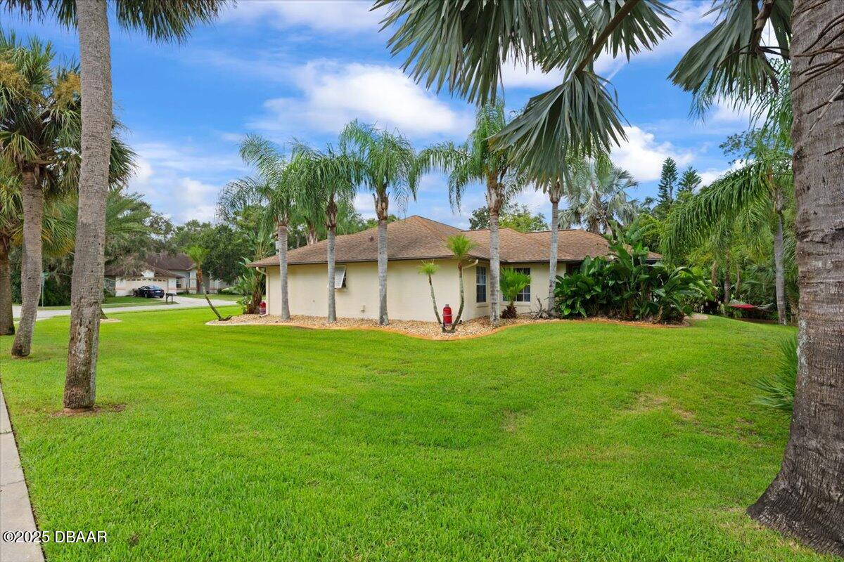 6225 Ranier Circle Port Orange, FL 32127 - Photo 35 of 50 a view of a house with a yard