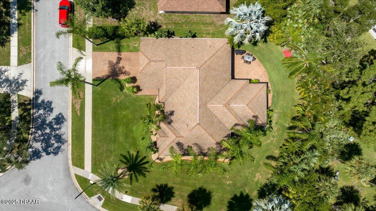 6225 Ranier Circle Port Orange, FL 32127 - Photo 36 of 50 an aerial view of a house with a yard and garden
