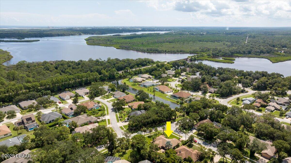 6225 Ranier Circle Port Orange, FL 32127 - Photo 42 of 50 a view of a lake with an outdoor space