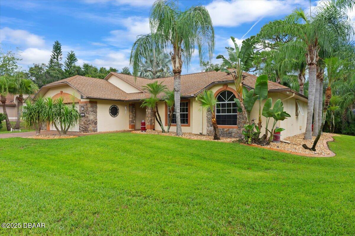 6225 Ranier Circle Port Orange, FL 32127 - Photo 50 of 50 a view of a house with a yard