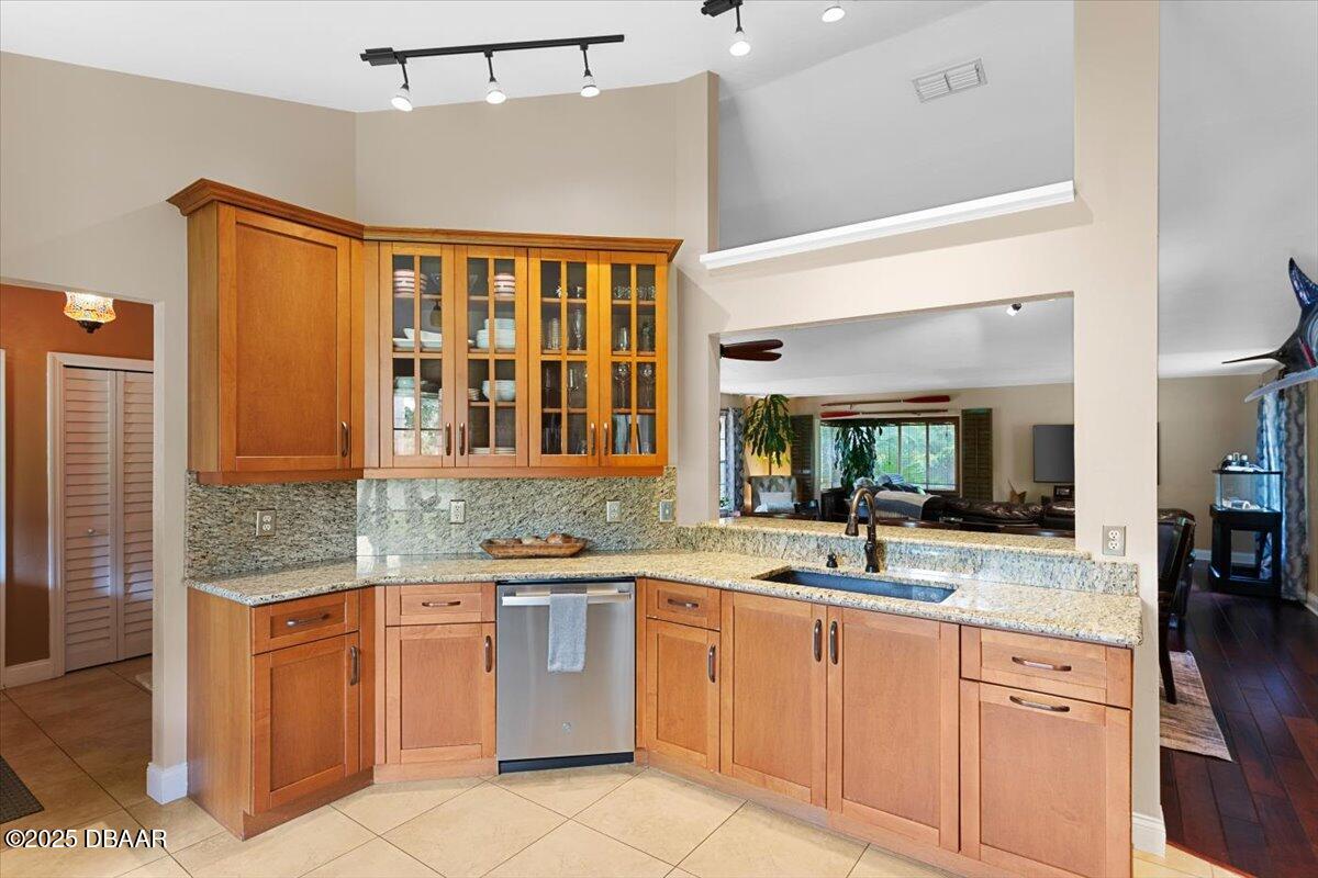 6225 Ranier Circle Port Orange, FL 32127 - Photo 6 of 50 a kitchen with a sink stove and cabinets