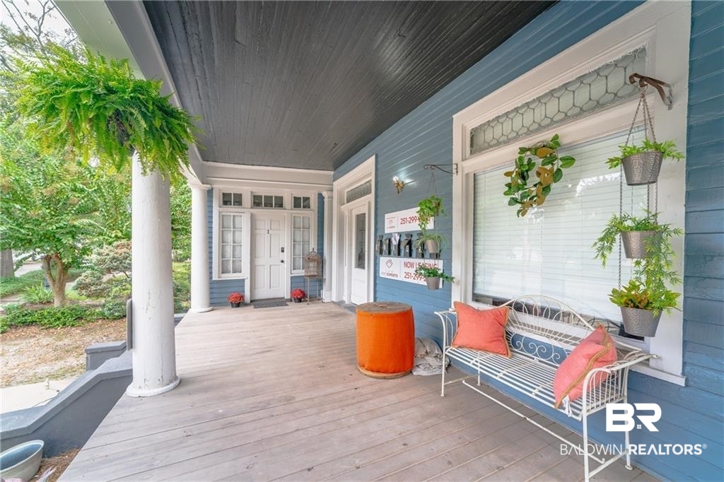 207 Michigan Avenue Mobile, AL 36604 - Photo 7 of 31 View of wooden porch