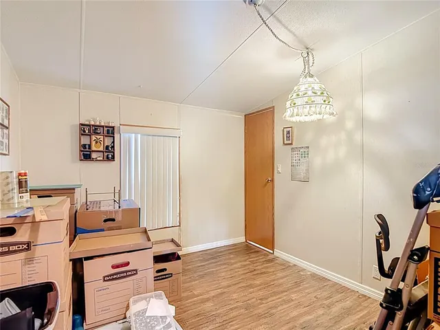 a workspace with furniture and a window