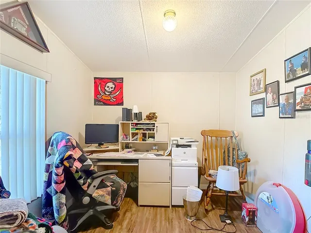 a view of a bedroom with baby bed
