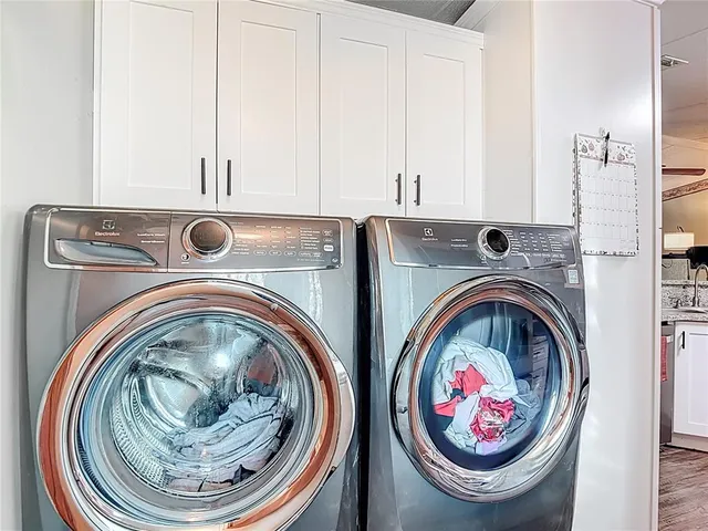a view of a balcony with furniture