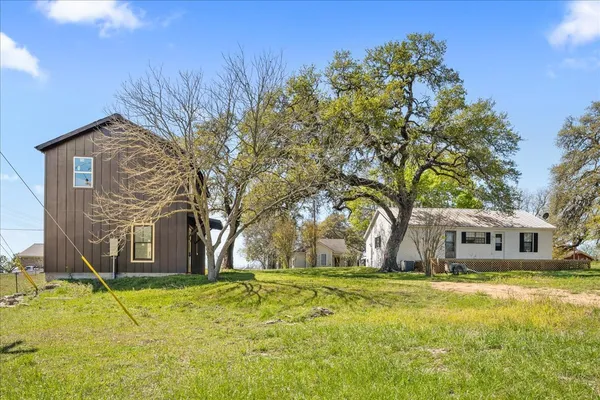 a house with trees in front of it