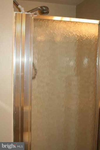 6 Hobb Court Perry Hall, MD 21128 - Photo 14 of 20 a bathroom with a glass shower door