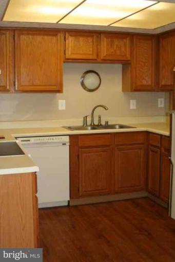 6 Hobb Court Perry Hall, MD 21128 - Photo 3 of 20 a kitchen with a sink a stove and cabinets
