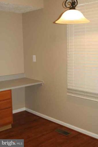 6 Hobb Court Perry Hall, MD 21128 - Photo 6 of 20 a view of a small space with wooden floor and fan