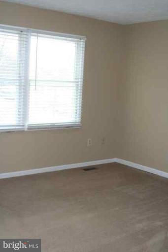 6 Hobb Court Perry Hall, MD 21128 - Photo 9 of 20 an empty room with a window