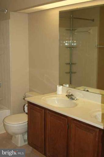 6 Hobb Court Perry Hall, MD 21128 - Photo 10 of 20 a bathroom with a sink a toilet and shower