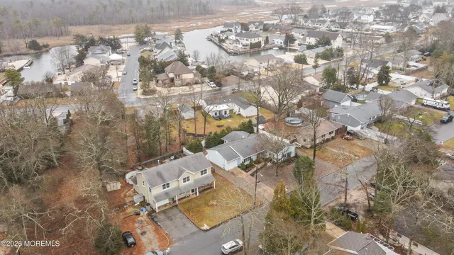 an aerial view of residential house with parking space