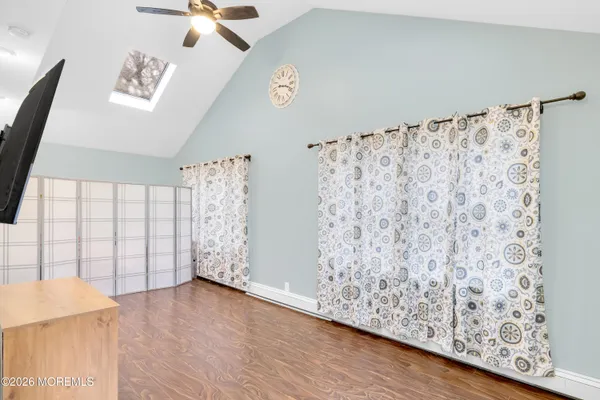 a view of hallway with a large window