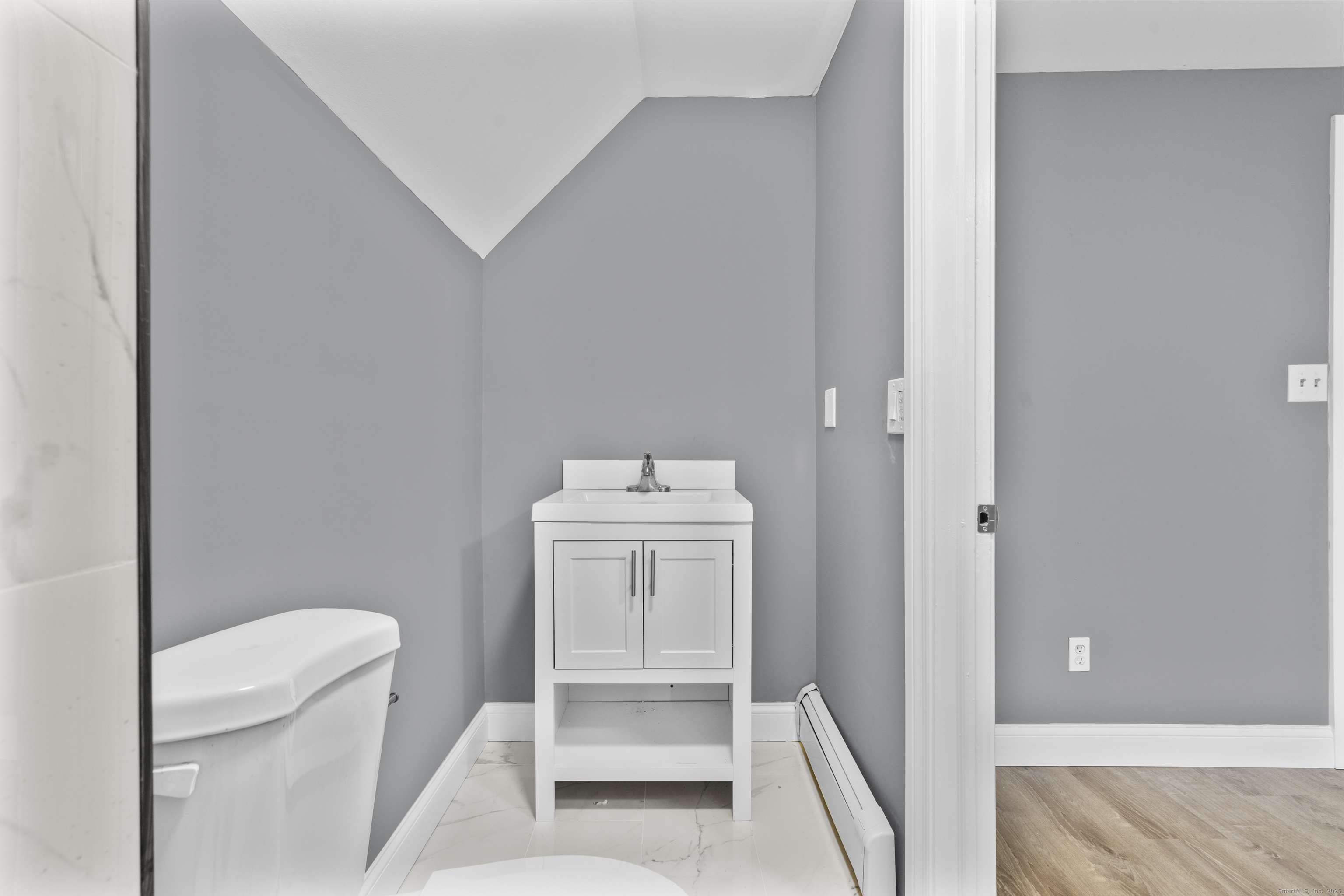 55 Elliott Street, Unit 3 New Haven, CT 06519 - Photo 15 of 18 a bathroom with a sink toilet and tub