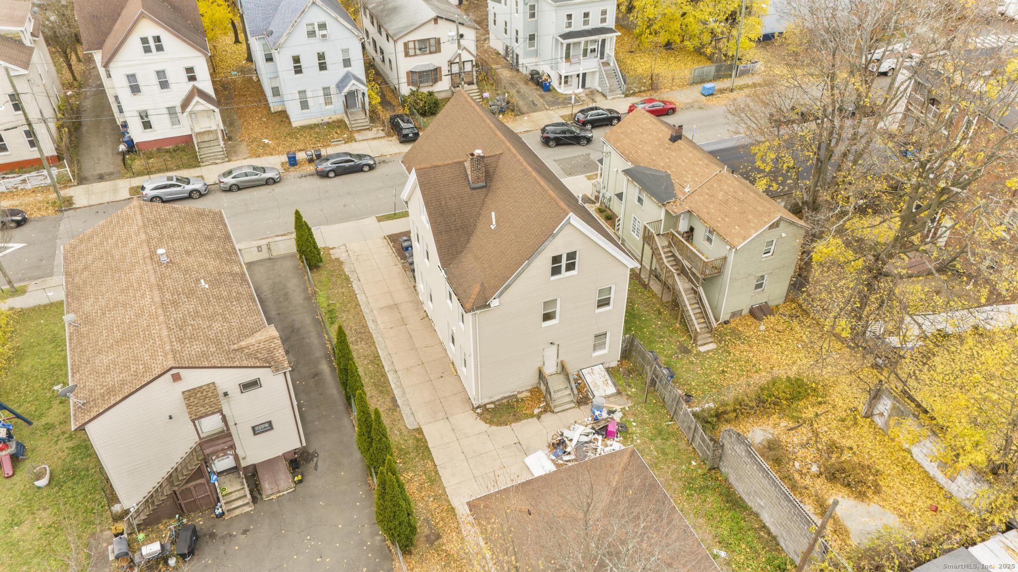 55 Elliott Street, Unit 3 New Haven, CT 06519 - Photo 17 of 18 an aerial view of a house with a swimming pool